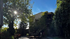 Outdoor dining - Double Ensuite Room in a Cosy Guesthouse in a Small Village (Quentar (Granada))