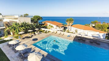 Seasonal outdoor pool, open 9:00 AM to 7:30 PM, pool umbrellas