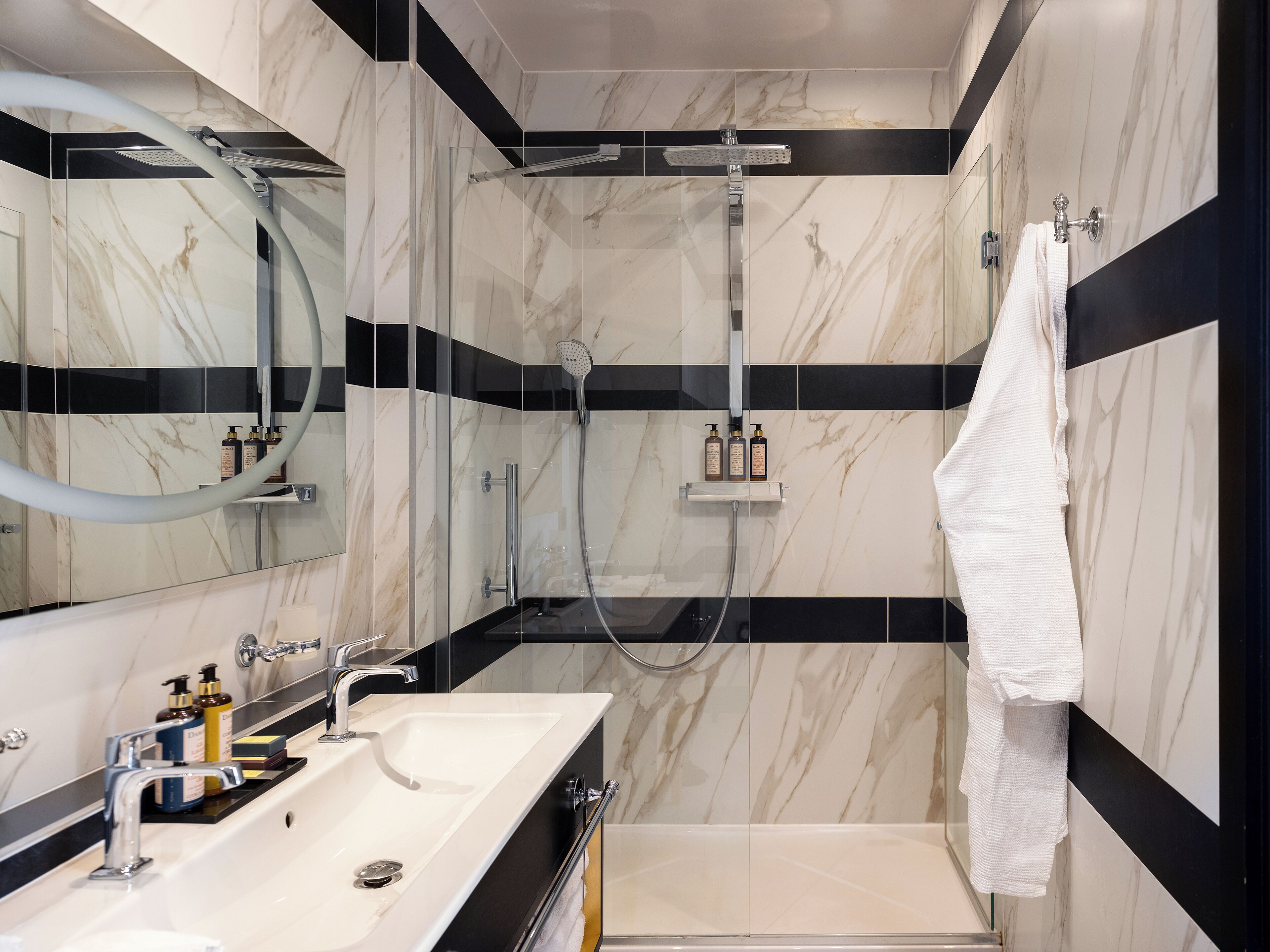 queen junior suite  | bathroom | designer toiletries, hair dryer, bathrobes, slippers