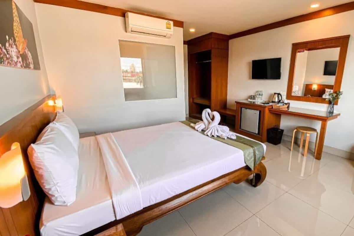 Desk, laptop workspace, blackout drapes, soundproofing