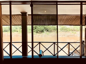 Family Room with Balcony and River View | Balcony view - Merry Riverside Hotel (Luang Prabang)