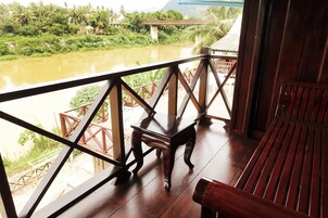 Family Room with Balcony and River View | Minibar, in-room safe, desk, soundproofing