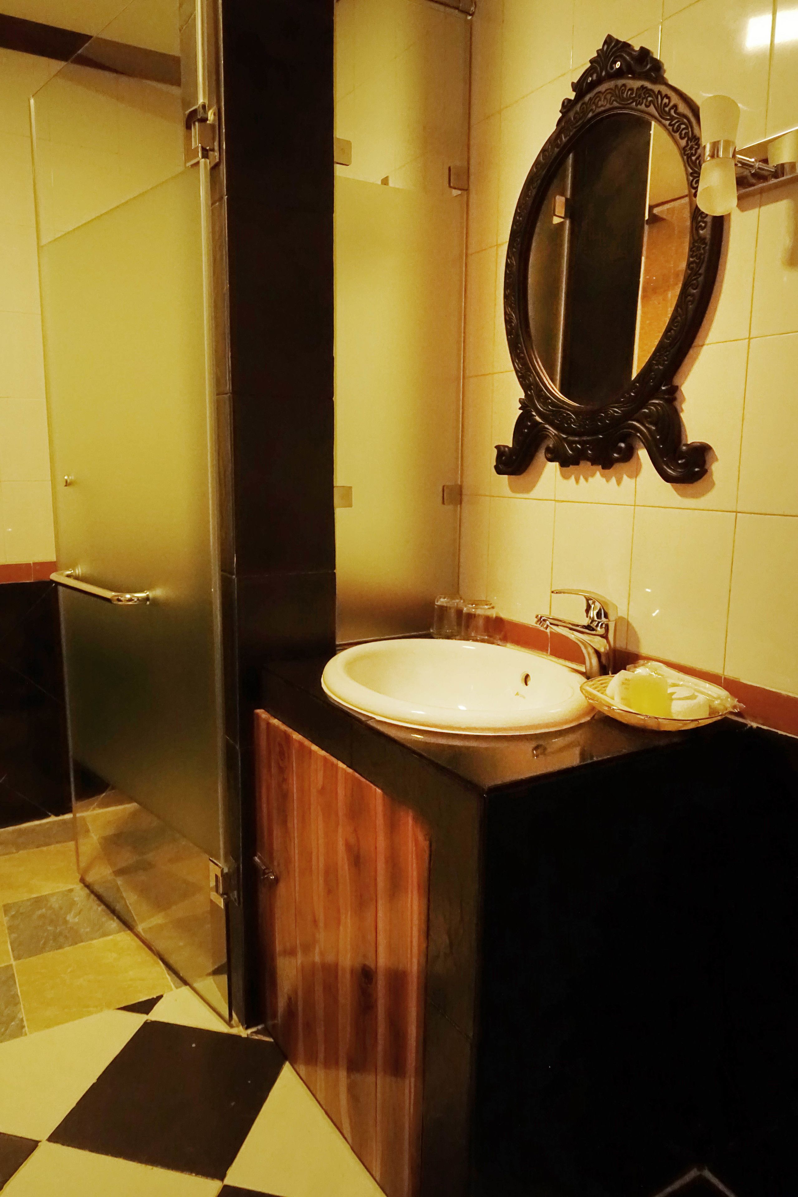 family room with balcony and river view | bathroom | shower, free toiletries, hair dryer, slippers