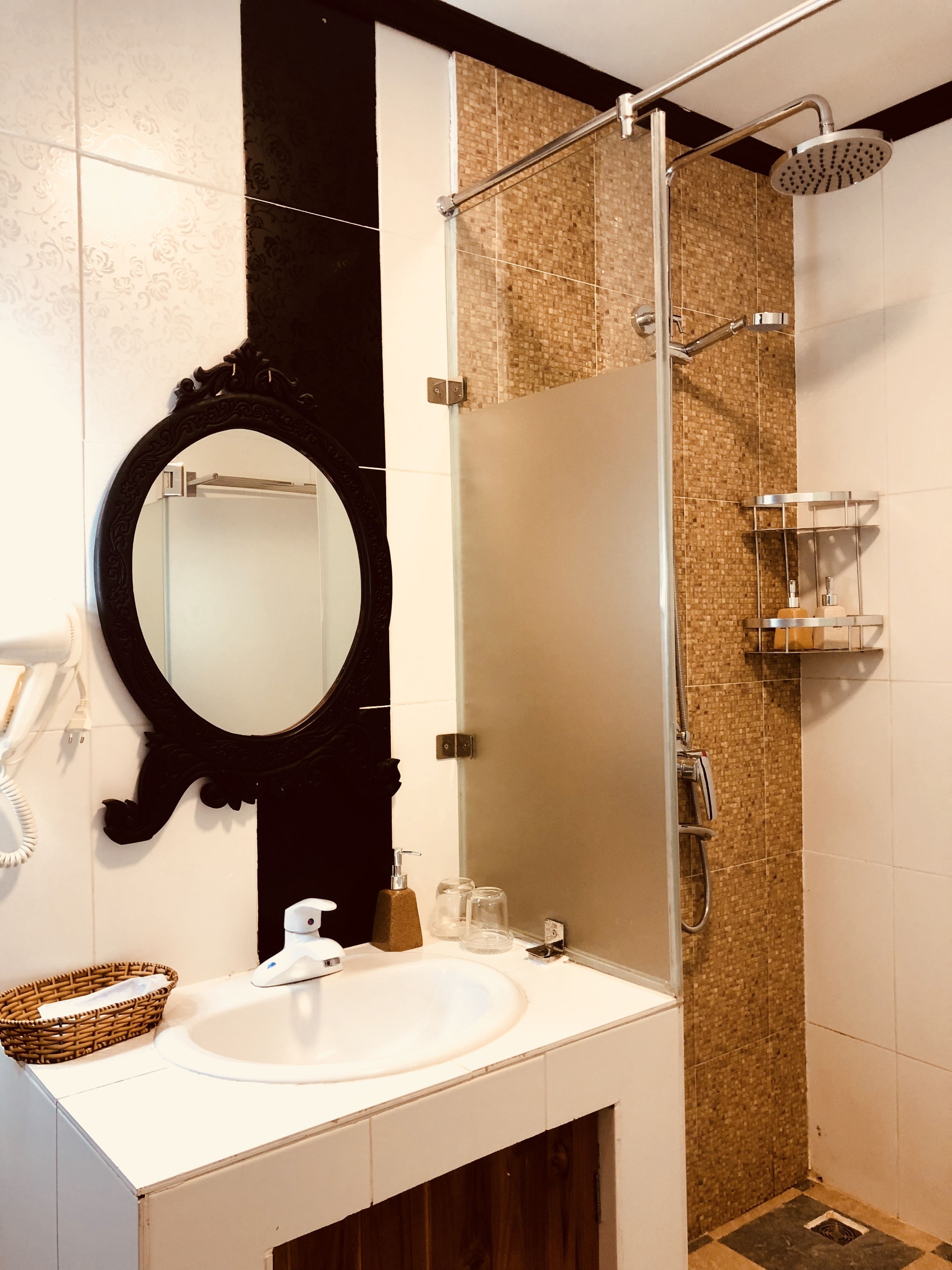 deluxe double room with river view | bathroom amenities | shower, free toiletries, hair dryer, slippers