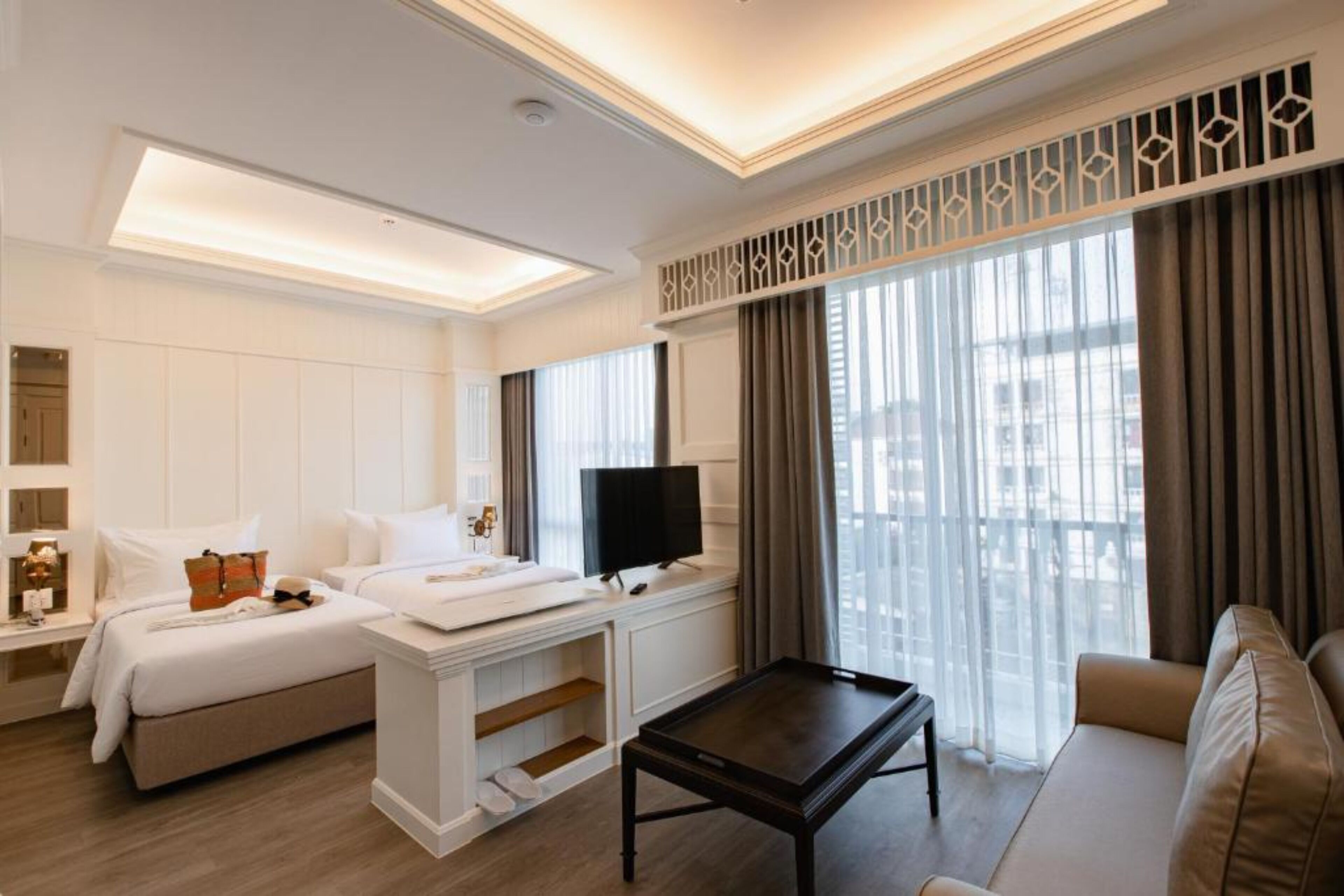 premier twin room | 2 bedrooms, desk, laptop workspace, blackout curtains