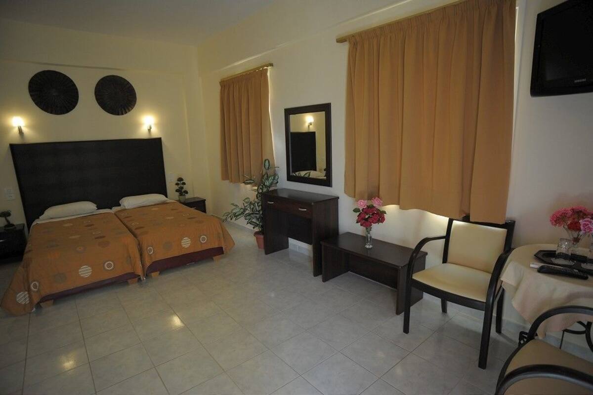 Quadruple Room, Balcony, Garden View | In-room safe, iron/ironing board (on request)