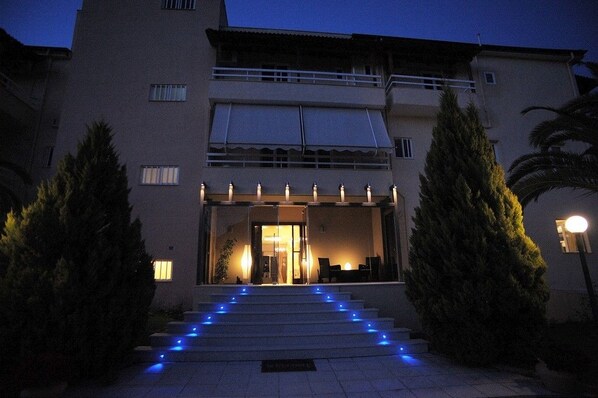 Front of property - evening/night - Hotel Afrika (Aigialeia)