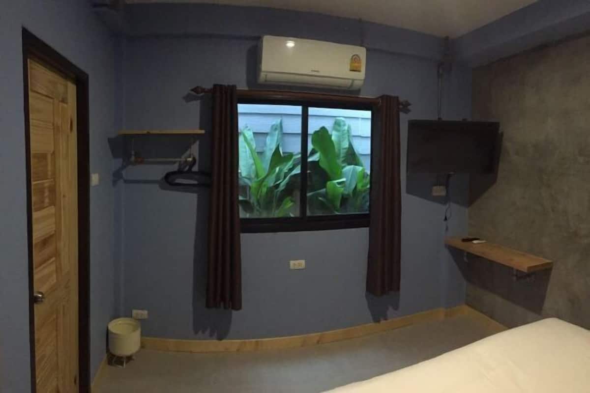 Desk, blackout curtains, iron/ironing board, rollaway beds