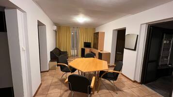 Premium Apartment, 2 Bedrooms | Living area | TV