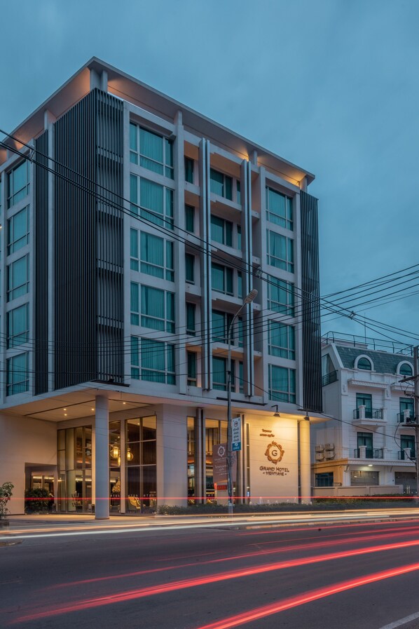A modern hotel building with a prominent entrance, large windows, and a visible sign for the Grand Hotel. - Grand Hotel Vientiane (Vientiane)