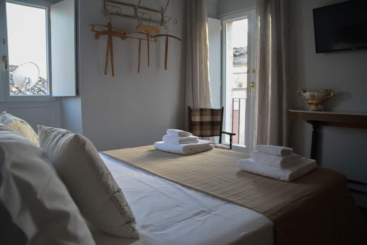 Premium bedding, desk, free WiFi, bed sheets