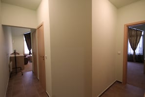 Apartment, 2 Bedrooms, Balcony, Mountain View | Living area | Flat-screen TV