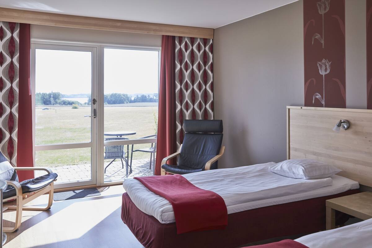 standard double room, 2 single beds | 1 bedroom, desk, blackout curtains, iron/ironing board