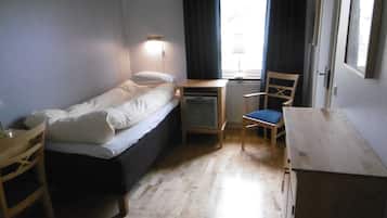 Single Room | Desk, blackout drapes, iron/ironing board, free cribs/infant beds