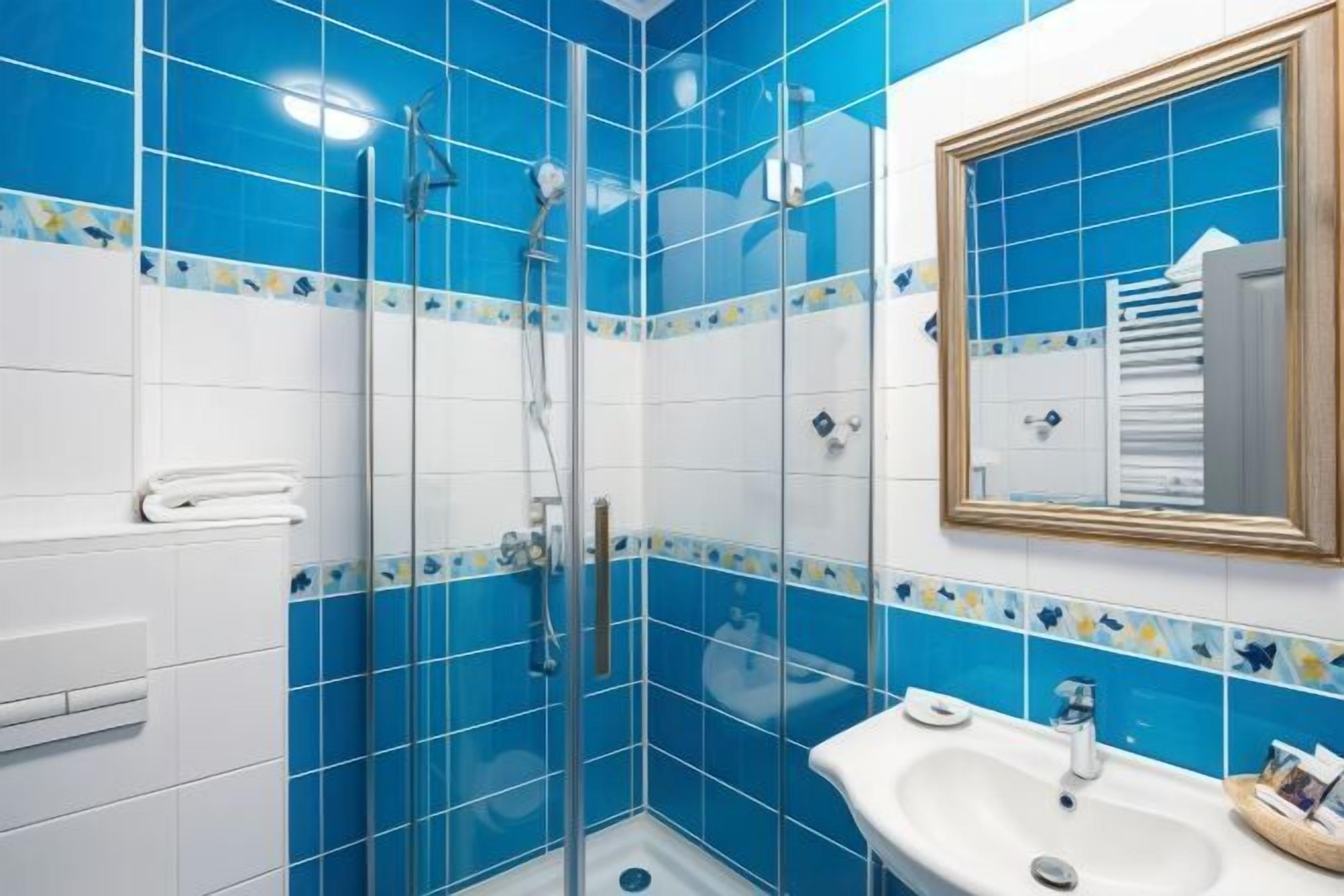 Baño | Regadera, amenidades de baño ecológicas, secadora de cabello, toallas 