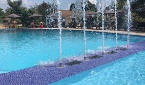 Outdoor pool, pool umbrellas, sun loungers