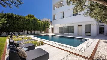 Outdoor pool, open 10:00 AM to 7:00 PM, sun loungers