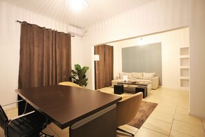 Business Suite, 1 Bedroom | Living area | 25-inch LED TV with cable channels, TV - GK Athens by GK Hospitality Group (Athens)