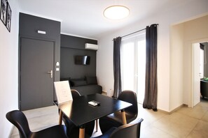 Deluxe Apartment, 1 Bedroom | Living area | 25-inch LED TV with cable channels, TV - GK Athens by GK Hospitality Group (Athens)