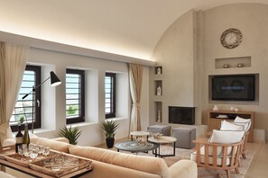 Villa Signature, 3 chambres, piscine privée | Salle de séjour | Télévision à écran plat de 55 pouces avec chaînes par satellite