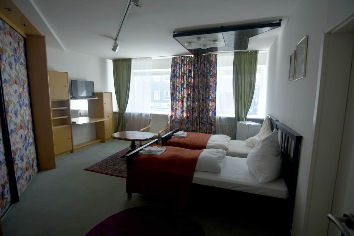 Premium bedding, minibar, desk, iron/ironing board