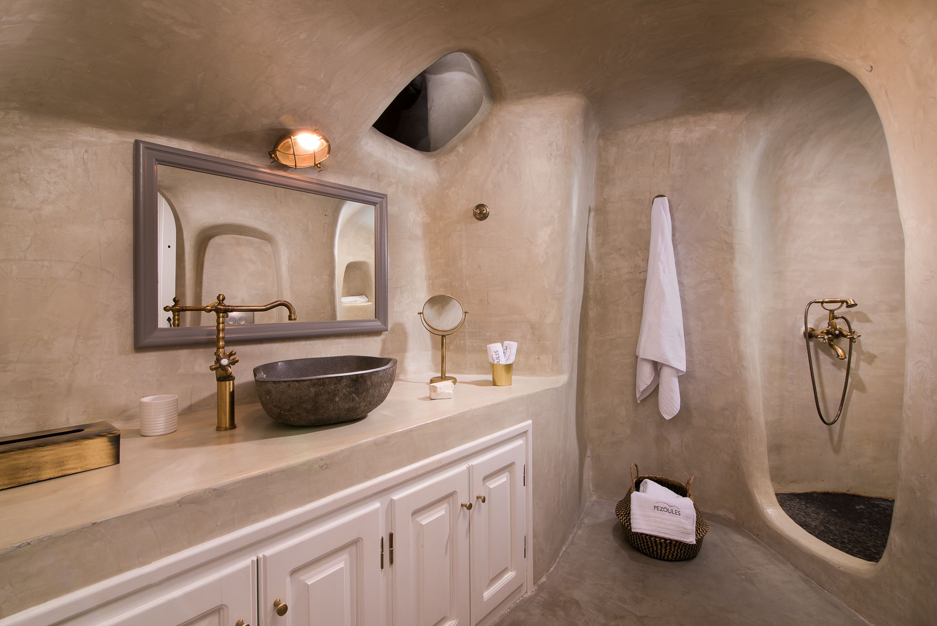 louisa cave suite with caldera view | bathroom | shower, free toiletries, hair dryer, bathrobes