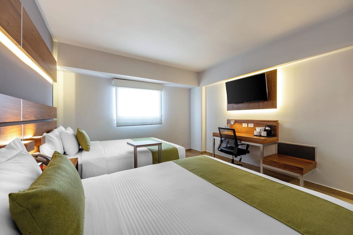 Premium bedding, in-room safe, desk, soundproofing