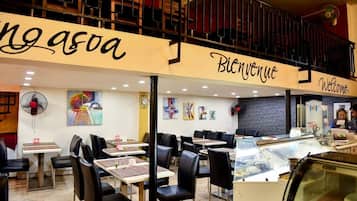2 restaurants, breakfast, lunch, dinner served; Indian cuisine