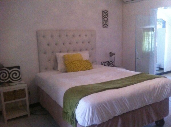 Camera doppia, vista giardino | Una scrivania, letti aggiuntivi (a pagamento), Wi-Fi gratuito