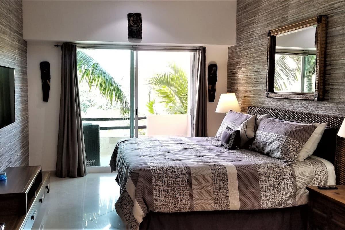 Premium Condo, 2 Bedrooms, Kitchen, Lagoon View | 1 bedroom, premium bedding, Tempur-Pedic beds, in-room safe