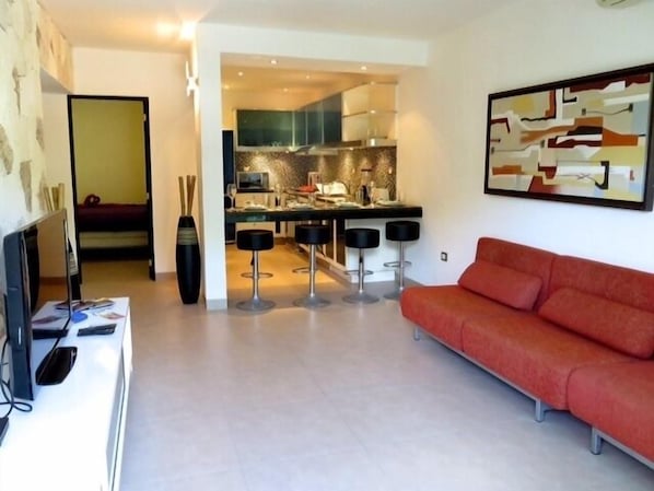 Apartment, 2 Bedrooms | Living area | Flat-screen TV, pay movies