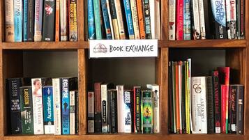 A bookshelf with a sign that reads "Book Exchange".