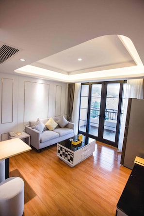Loft estándar | Sala de estar | Televisión 