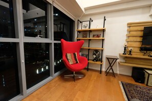 Quarto standard | Sala de estar | TV de tela plana