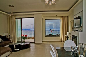 Deluxe Villa, Sea View | Living room | 45-inch flat-screen TV with satellite channels, plasma TV, DVD player - Beach Front Villa Katrin (Hersonissos)