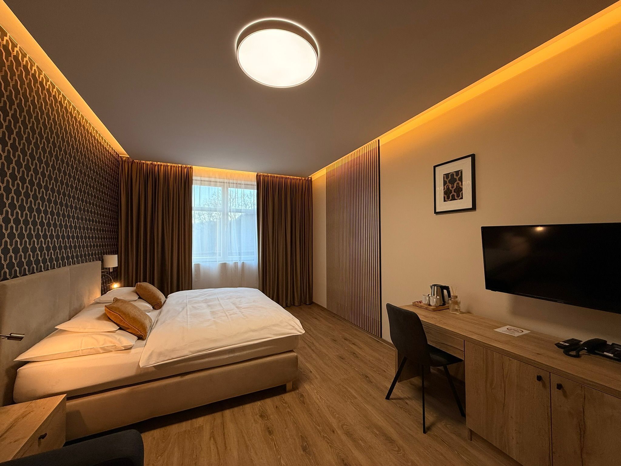 Deluxe Double Room | In-room safe, desk, blackout drapes, iron/ironing board