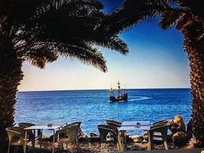 Beach nearby, black sand, 3 beach bars