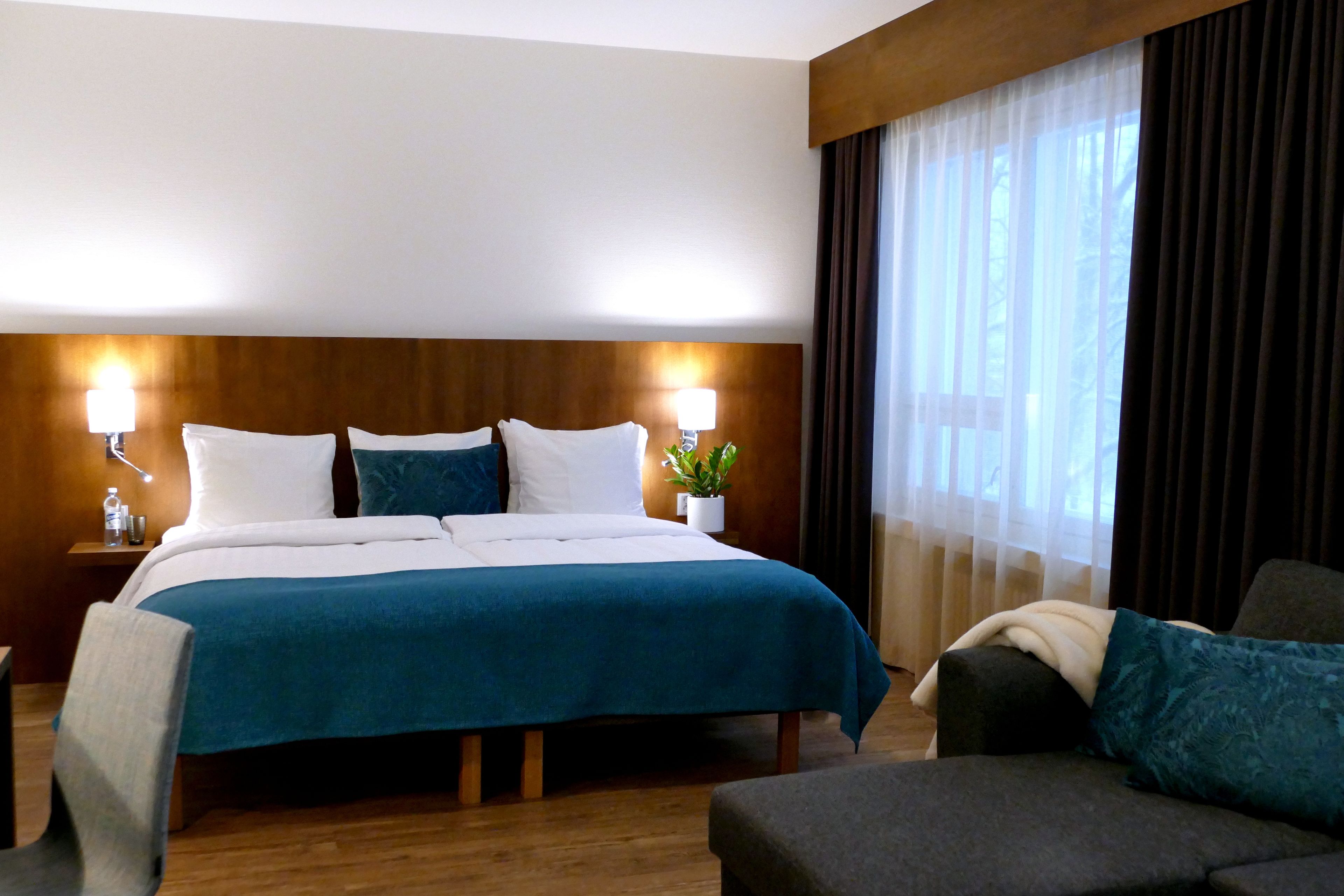 junior studio suite, 1 king bed, sauna | desk, blackout curtains, iron/ironing board, free wifi