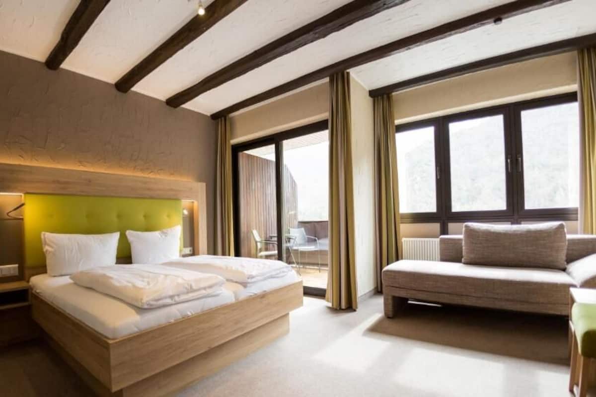 premium bedding, desk, blackout curtains, free wifi