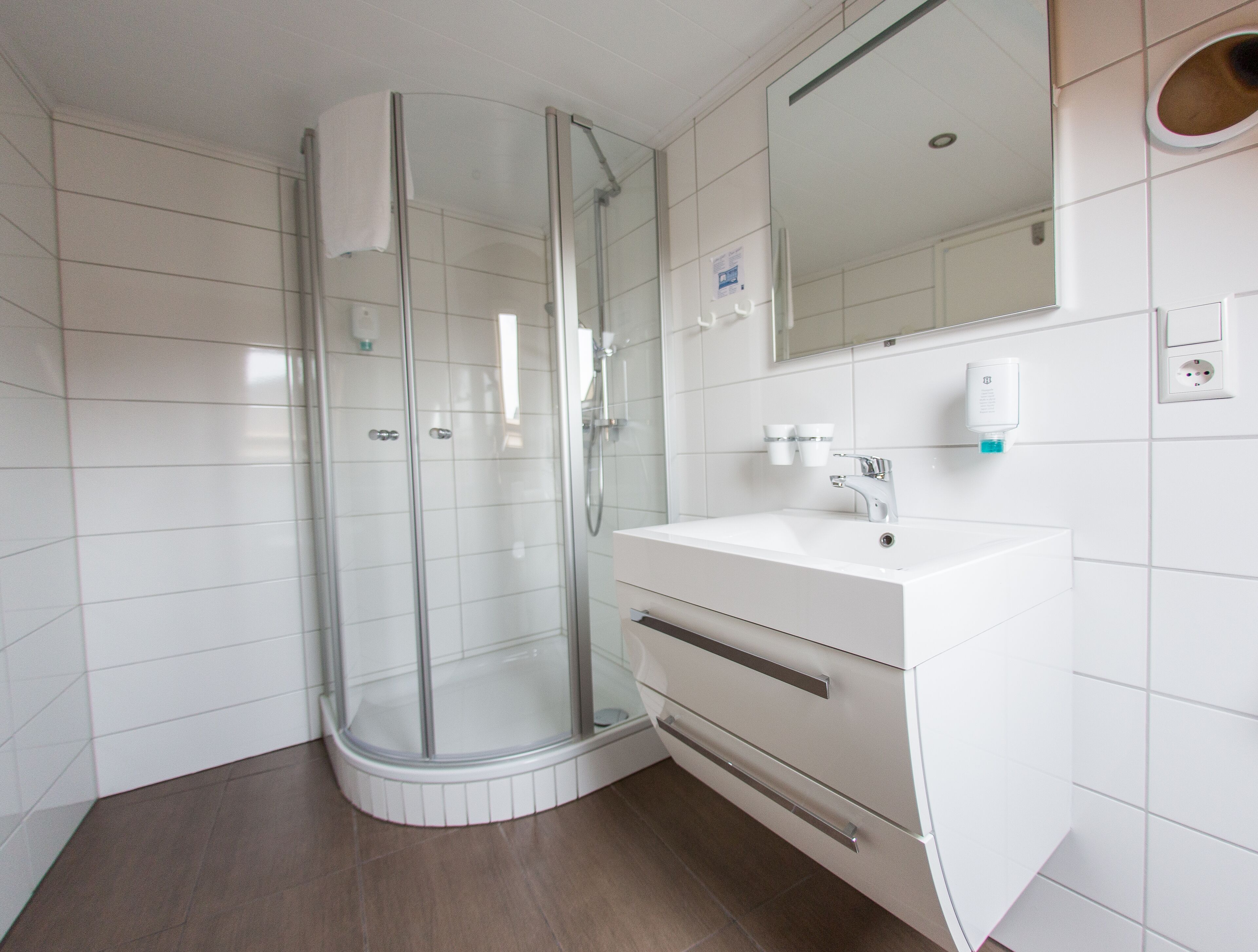 shower, free toiletries, hair dryer, slippers