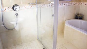 Bathtub, hair dryer, towels, soap