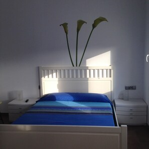 4 habitaciones, tabla de planchar con plancha, wifi y ropa de cama 