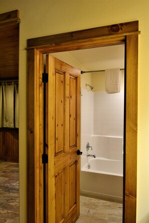 Premium Double Room, 2 Queen Beds | Bathroom | Combined shower/bathtub, free toiletries, hair dryer, towels - McAllister Inn & Lodging (McAllister)
