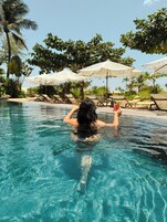 2 outdoor pools, open 10:00 AM to 10:00 PM, pool umbrellas, sun loungers