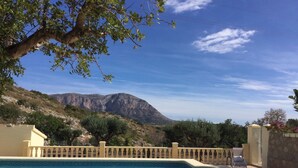 A swimming pool with a view of mountains in the background. - Rural villa with private outdoor pool, separate annexe and vast outdoor spaces (Gata De Gorgos)