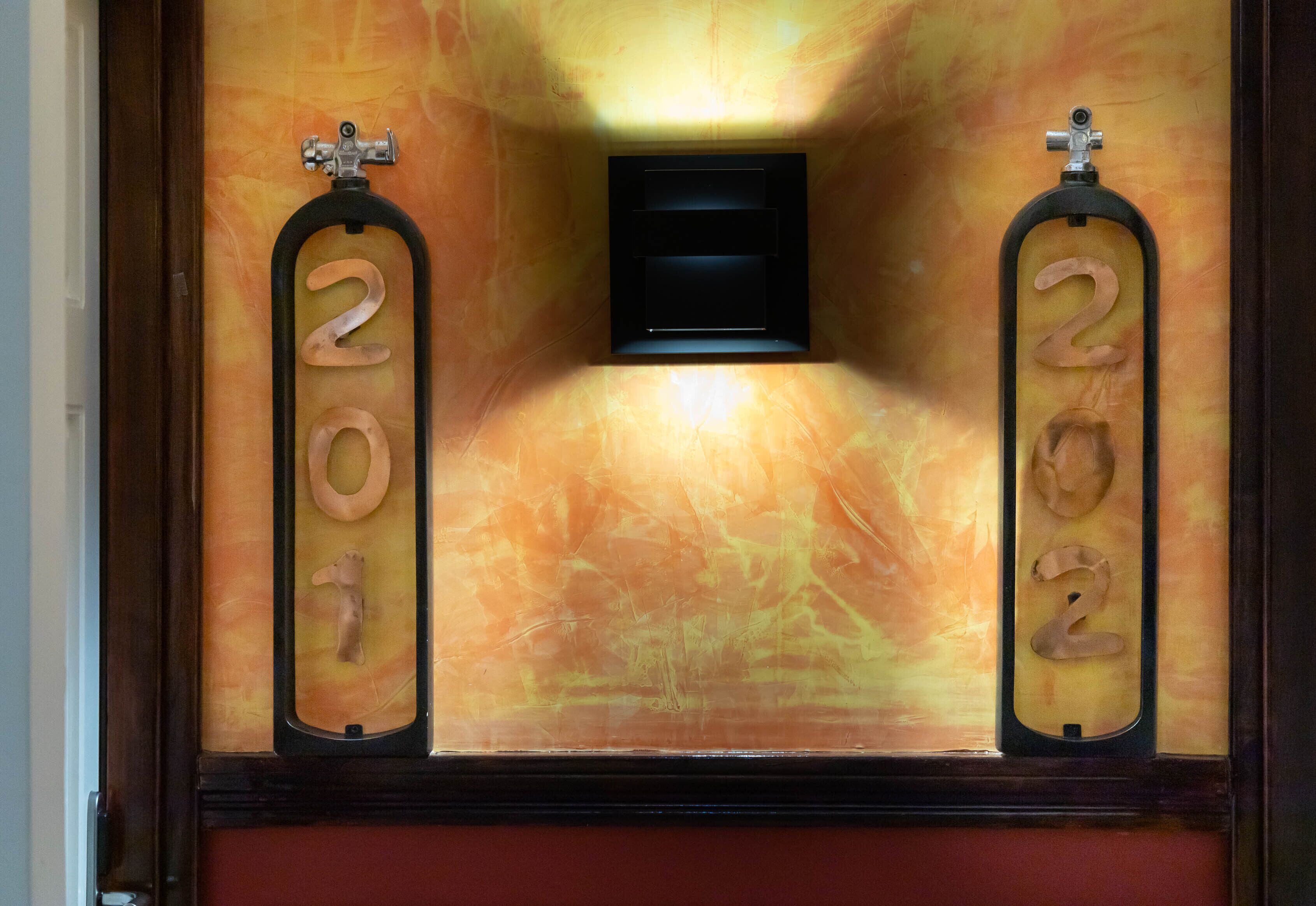 A room with a unique wall design featuring the numbers 2017 and 2018.