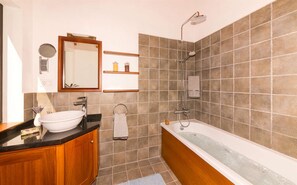 Jetted tub, hair dryer, towels, soap