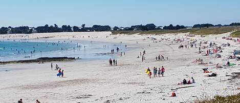 On the beach, sun loungers, beach towels