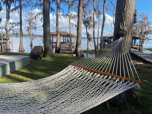 Secluded lake front w/ private dock, boat lift, large screened porch