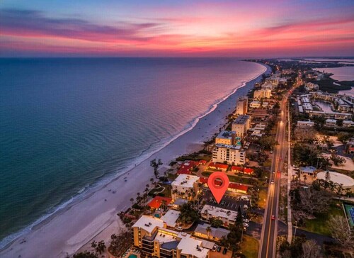 Sunset and beach view from your balcony Unit 403